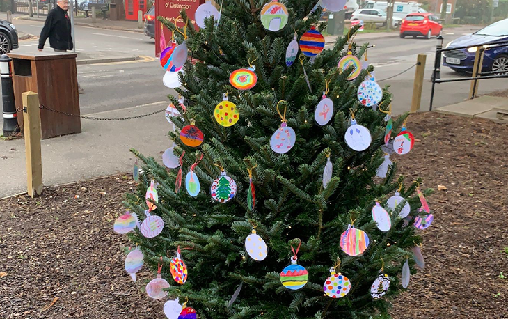 Local School Children Decorate Tree Outside James And Thomas - James 